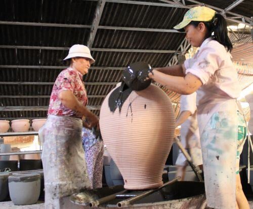 Adding Glaze to Pottery